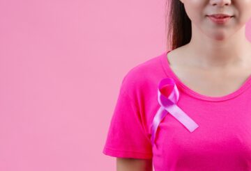 woman with breast cancer awareness ribbon