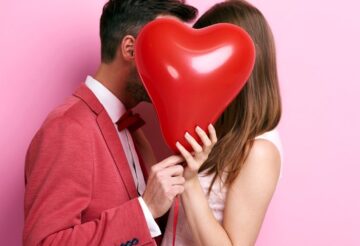 couple with heart balloon